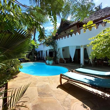 Moyo Apartment Pwani Mchangani Bagian luar foto